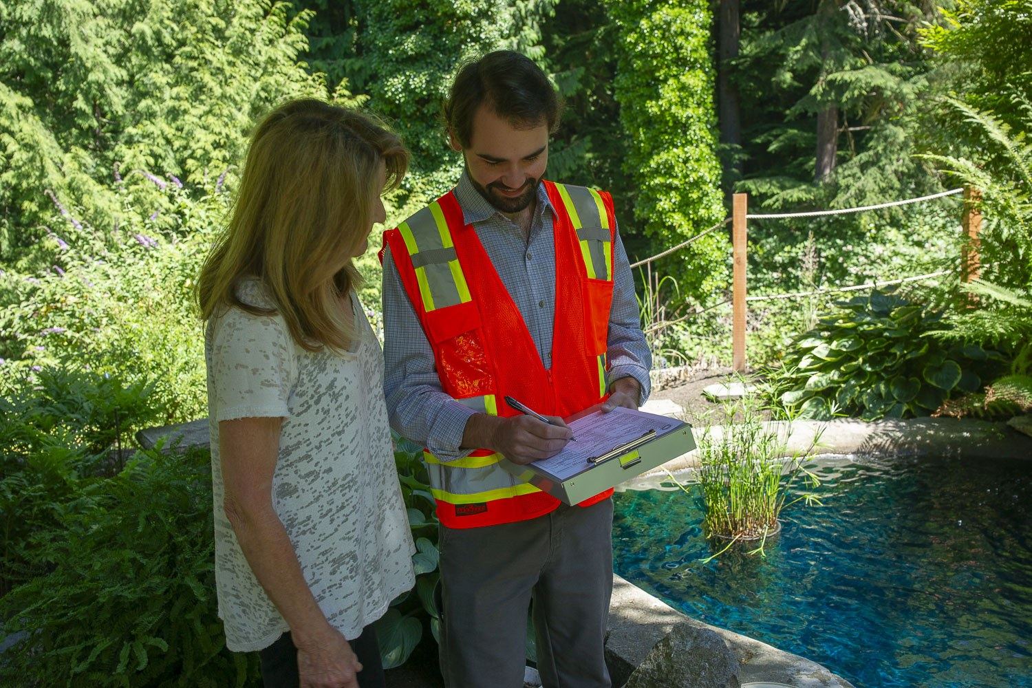 Technician reviewing options with a homeowner